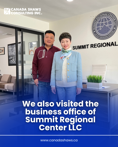 Two people standing in the reception area of Summit Regional Center LLC office during a business visit in Los Angeles.
