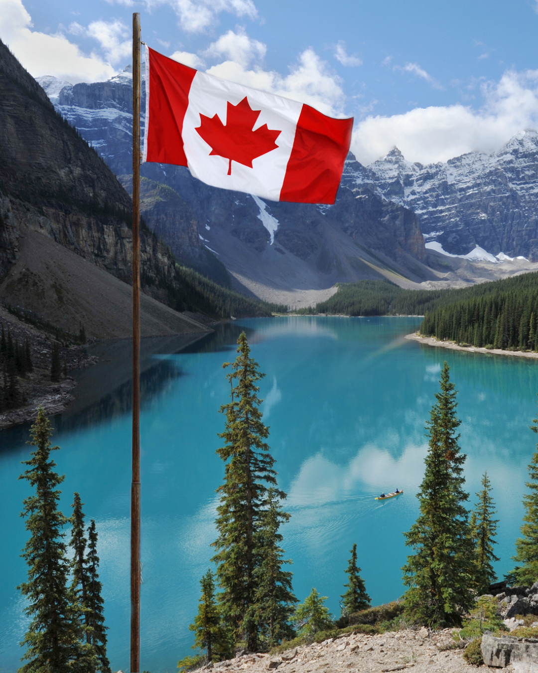 Canadian flag flying high over Moraine Lake in Banff National Park, Alberta, with turquoise waters and snow-capped Rockies in the background.