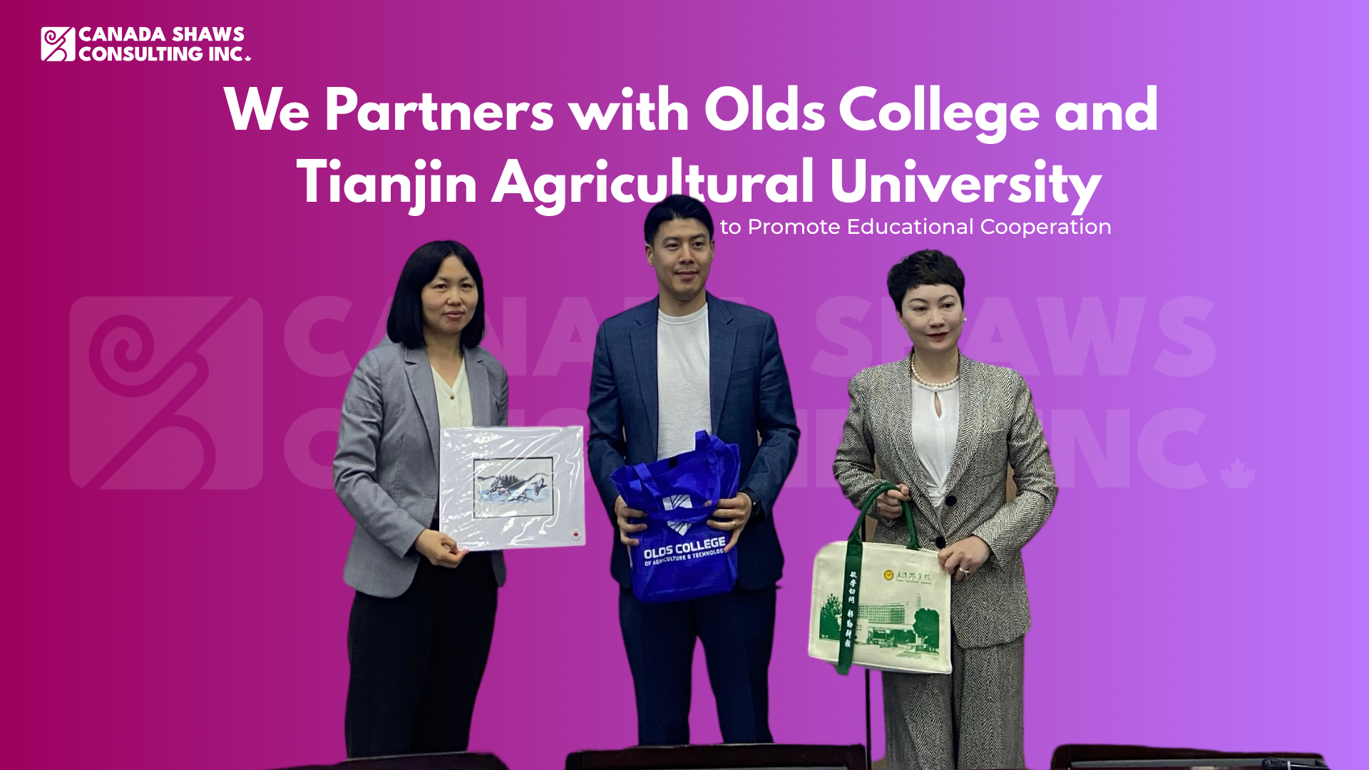 Photo of three representatives from Tianjin Agricultural University, Olds College, and Canada Shaws during a gift exchange ceremony. Each person is holding a commemorative gift bag or framed artwork, standing against a purple backdrop with Canada Shaws branding faintly in the background.