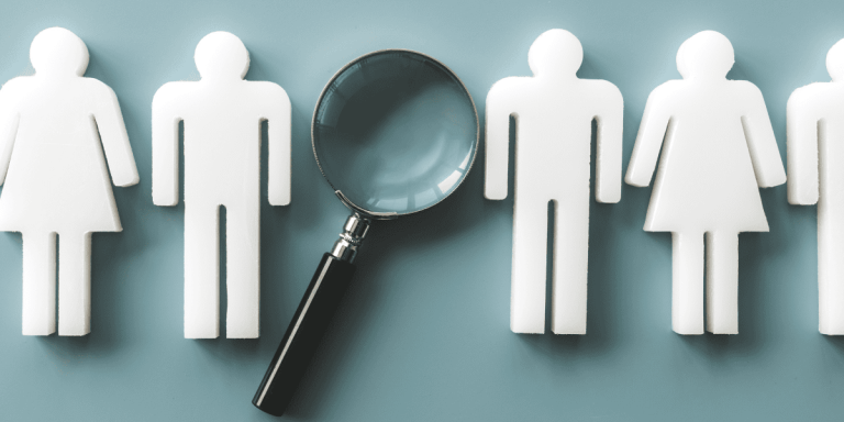 magnifying glass focusing on diverse gender symbols, for hire foreign workers search