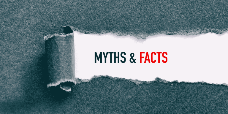 immigration myths vs facts concept with torn paper revealing truth