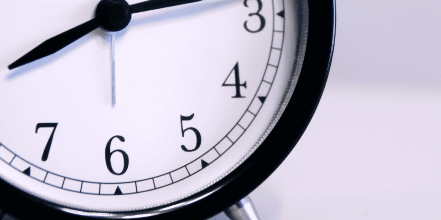 immigration myths about long processing times shown with clock closeup