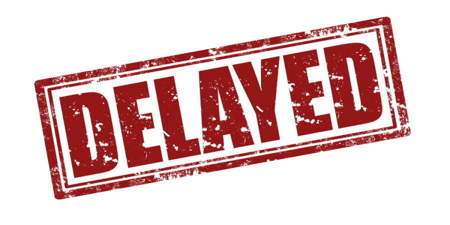 red delayed stamp highlighting lmia delays in canada process