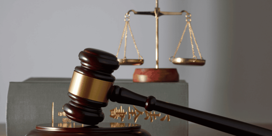 gavel and scales of justice symbolizing law and refugee status cases