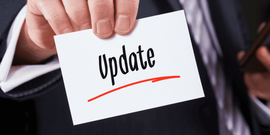 person holding card showing update related to express entry process information