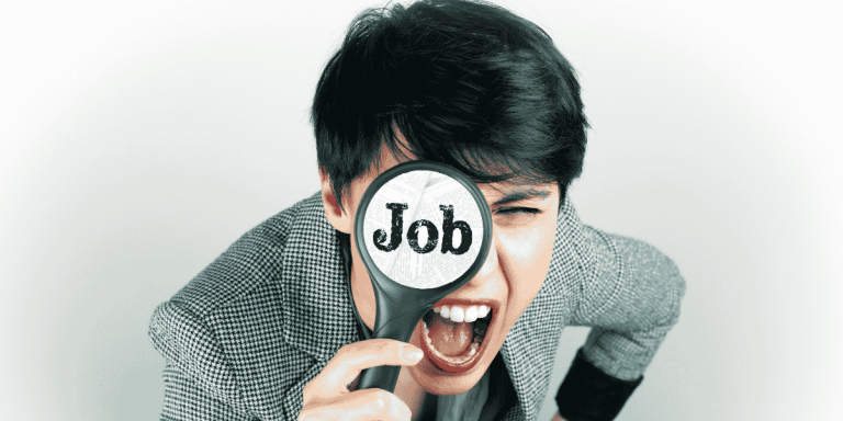 job seeker searching for high-demand jobs with a magnifying glass