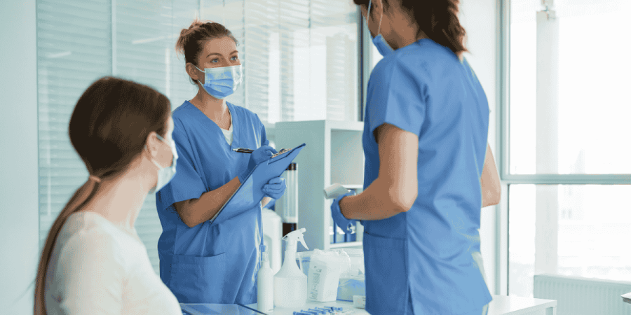healthcare professionals discussing high-demand jobs in the medical field