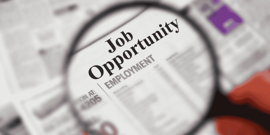 job opportunity search for it jobs in canada using magnifying glass on employment page